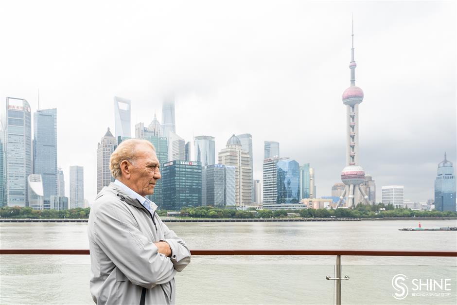 luxury cruise liner docks on north bund, with 300 international tourists