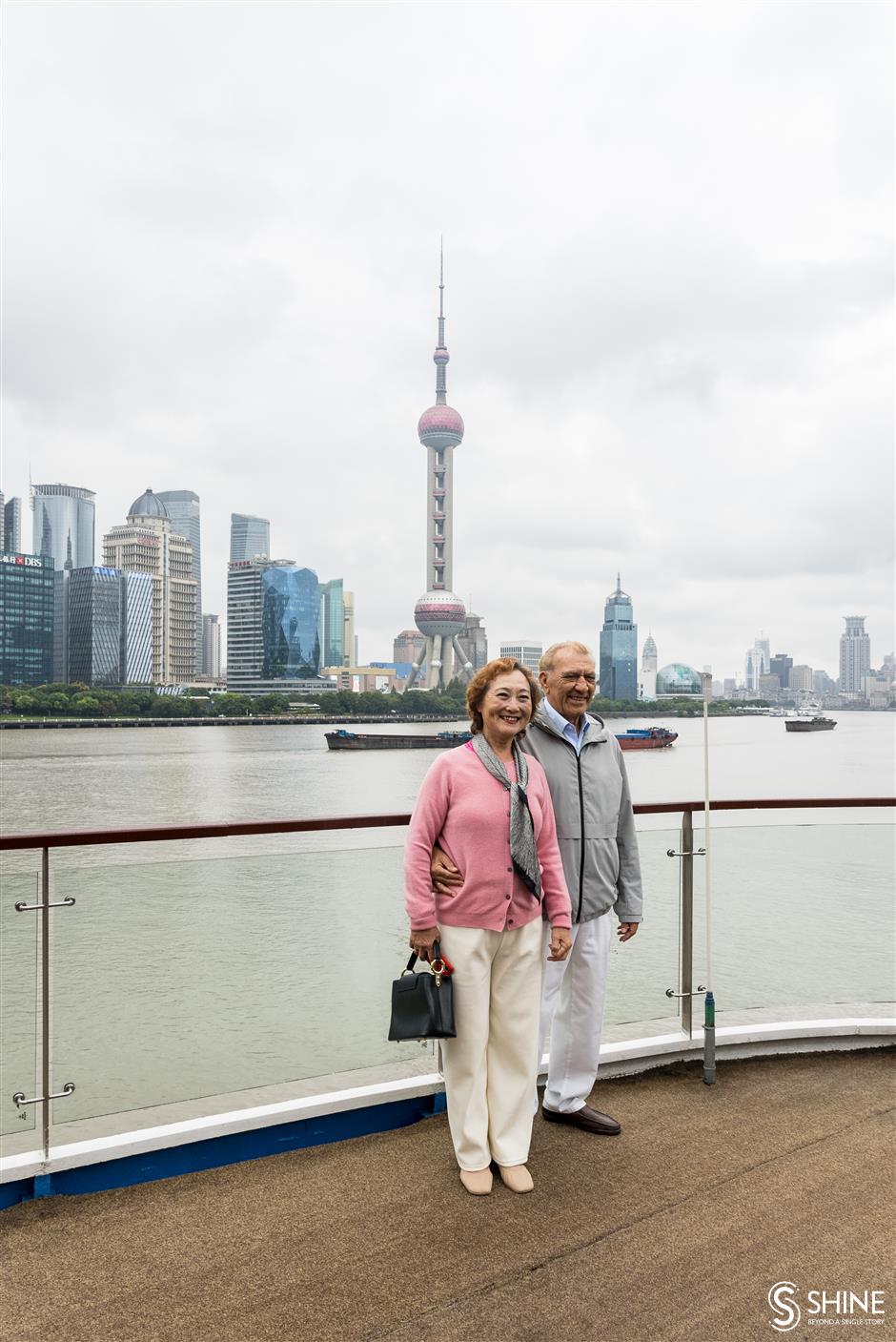 luxury cruise liner docks on north bund, with 300 international tourists